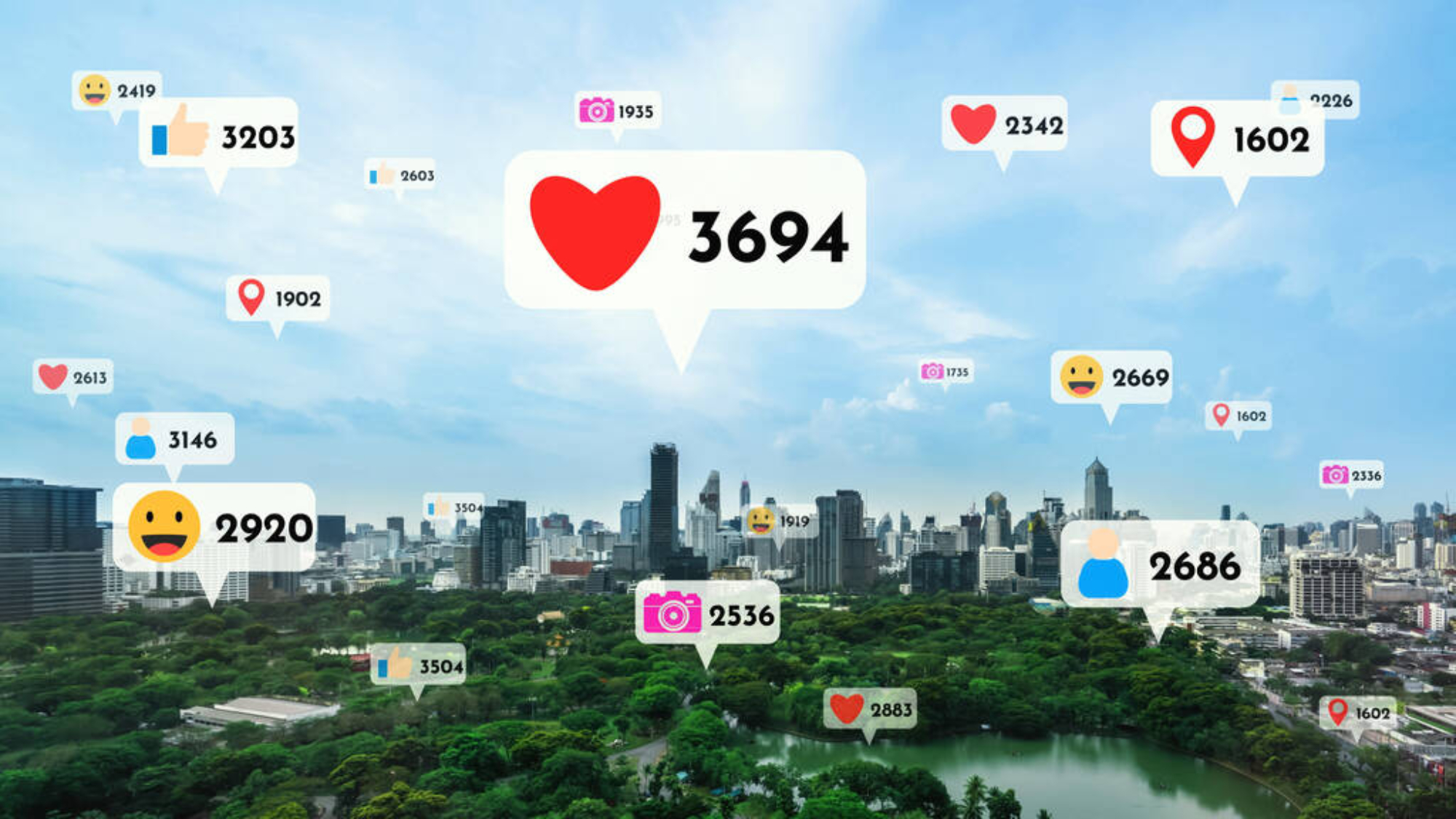Social media icons fly over city downtown showing people reciprocity connection through social network application platform . Concept for online community and social media marketing strategy .